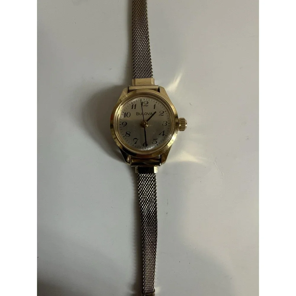 Vintage gold-tone women's mechanical watch by Bulova, manual-wind (mini model)